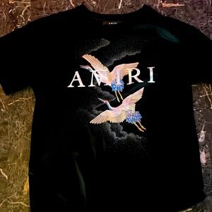Amiri medium t shirt kinda short on bottom